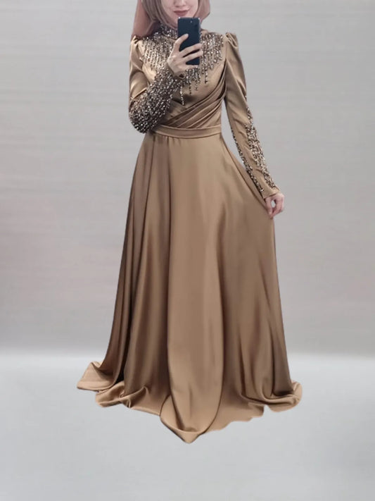 A64 - Abendkleid in gold mit Steinchen