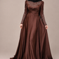 Abendkleid mit Schmucksteinen und Drapierung