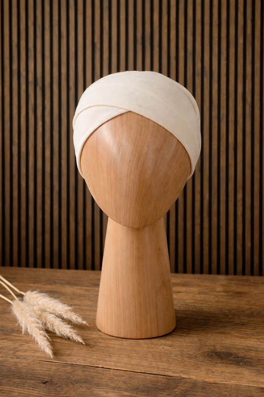 Schlauch Bonnet über Kreuz crembeige