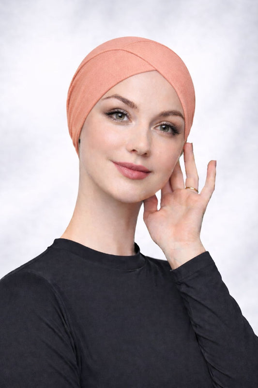 Schlauch Bonnet über Kreuz Apricot-Rosé